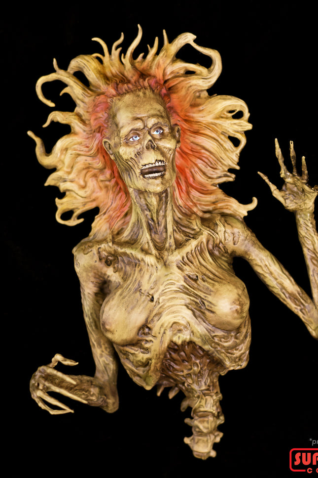 Front View of the Half-corpse statue, set against a black background.