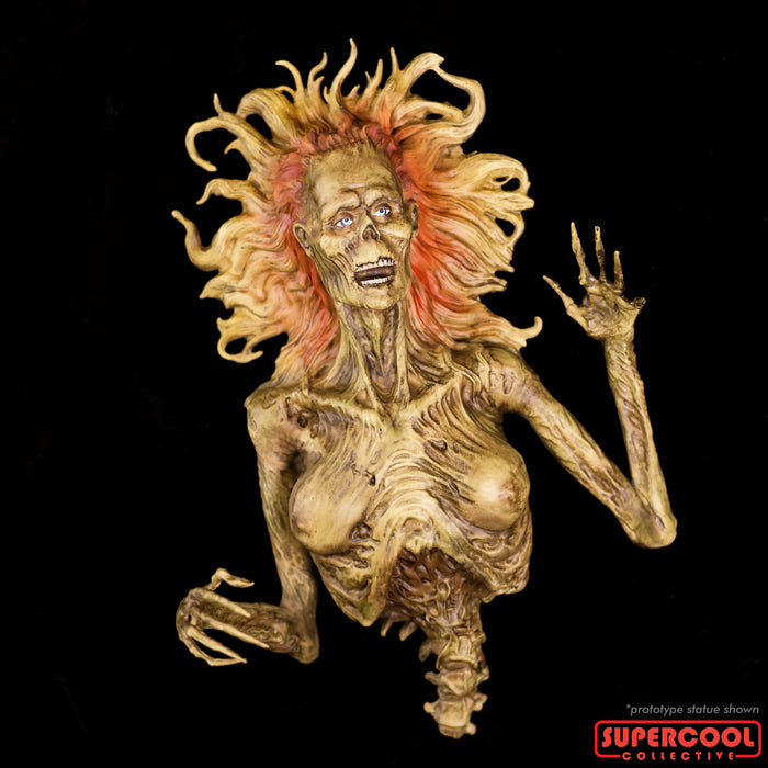 Front View of the Half-corpse statue, set against a black background.